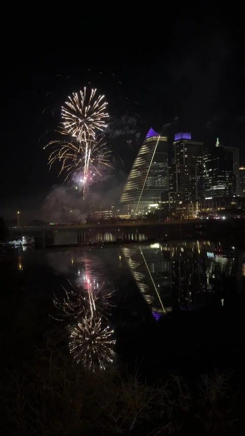 Vertical orientation fireworks display shot on mobile phone for social media 스톡 동영상 228821413