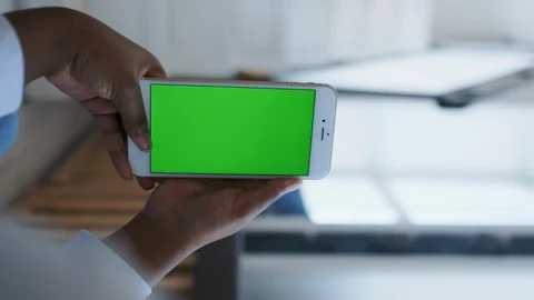 Vertical Orientation shoot. Green Screen or Chroma key Tracking Display on Stock Footage 121101531