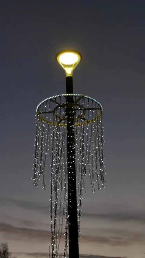 Vertical outdoor lamp with strings of led lights Stock Footage 230219114
