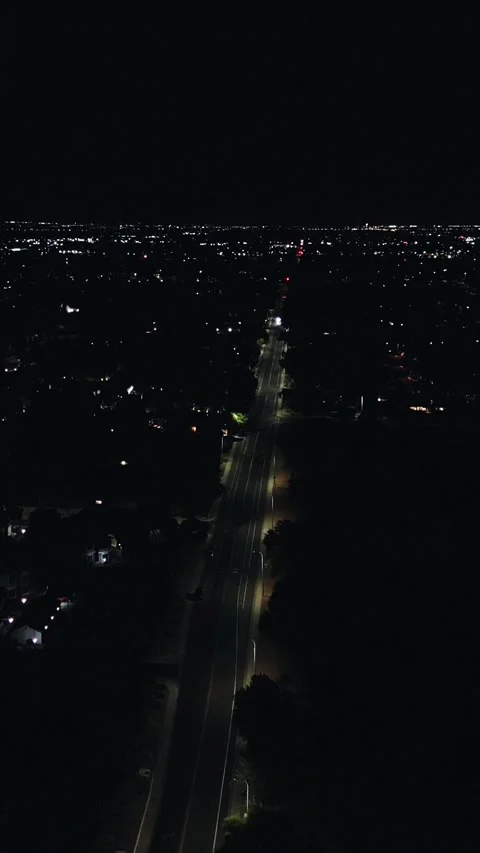 VERTICAL OVERHEAD NIGHT DRIVE BY Stock Footage 248583427