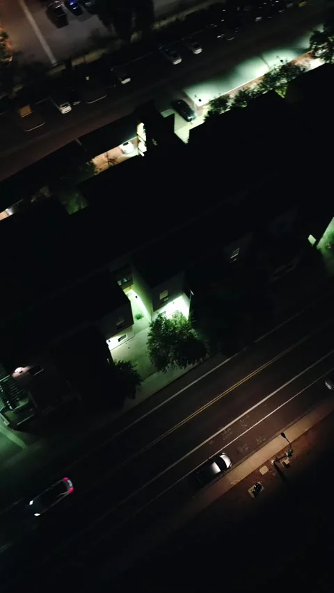 VERTICAL OVERHEAD NIGHT DRIVE TILT Video stock 248580534