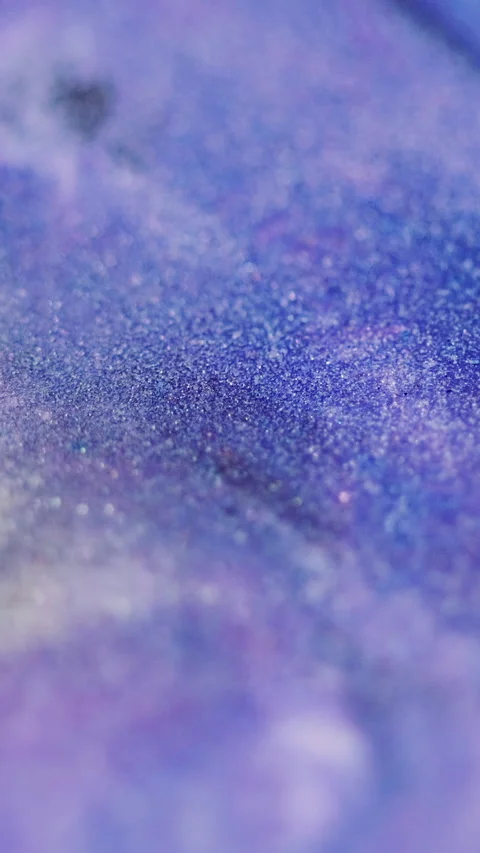 Vertical paint drop glitter ink splash blue purple Video stock 284789185
