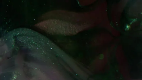 Vertical paint leak blur sparkling flow sphere Stock Footage 333789732