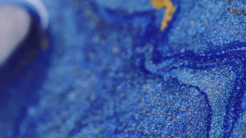 Vertical paint mix background glitter ink drip blue gold Video stock 272563131