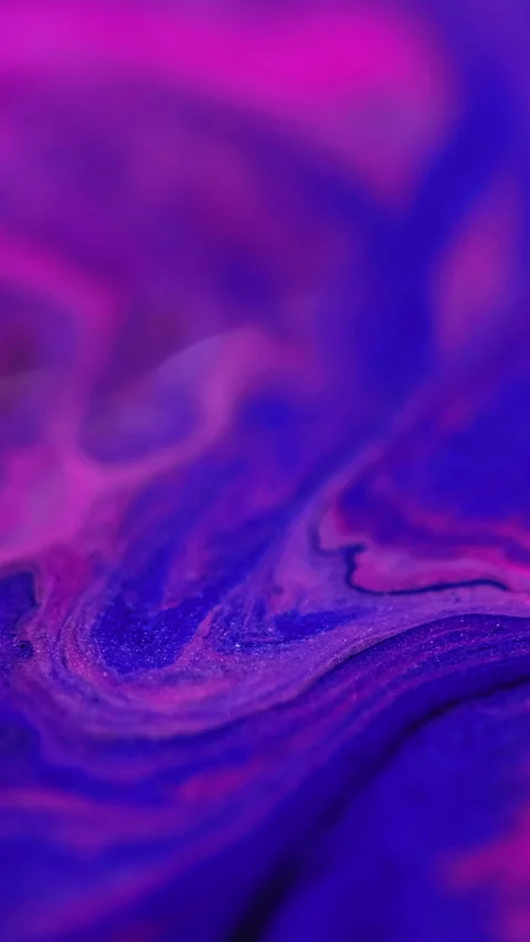 Vertical paint mix fluid spill neon blue pink ink Stock Footage 285365335