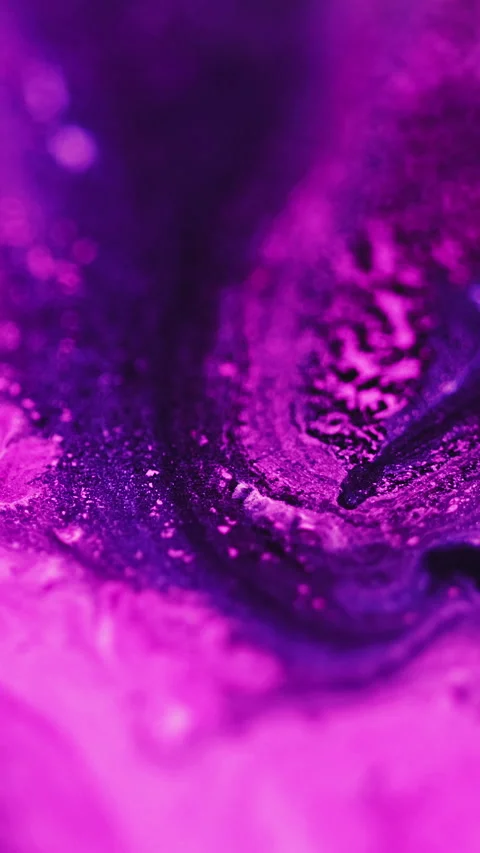 Vertical paint mix neon background pink purple ink Video stock 284901333