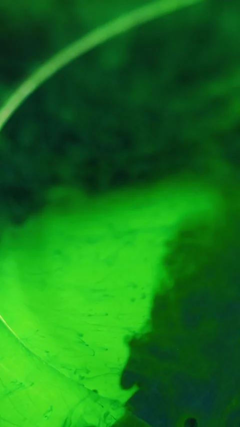 Vertical paint splash oil blob color mist green Stock Footage 284292584