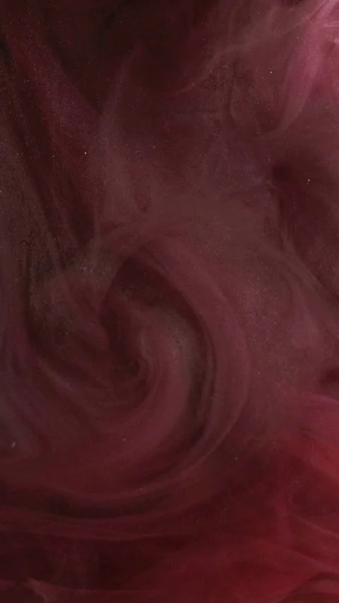 Vertical paint swirling glitter liquid glow smoke Video stock 314629524