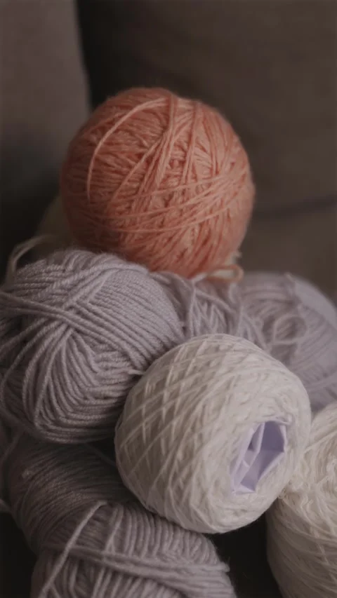 Vertical palette of various wool yarn colors for knitting hobby Stock Footage 337451994