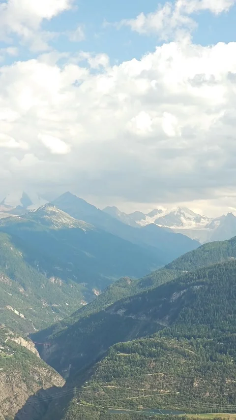 Vertical Pan Across Alpine Mountain Valley From High Viewpoint Stock Footage 342752241
