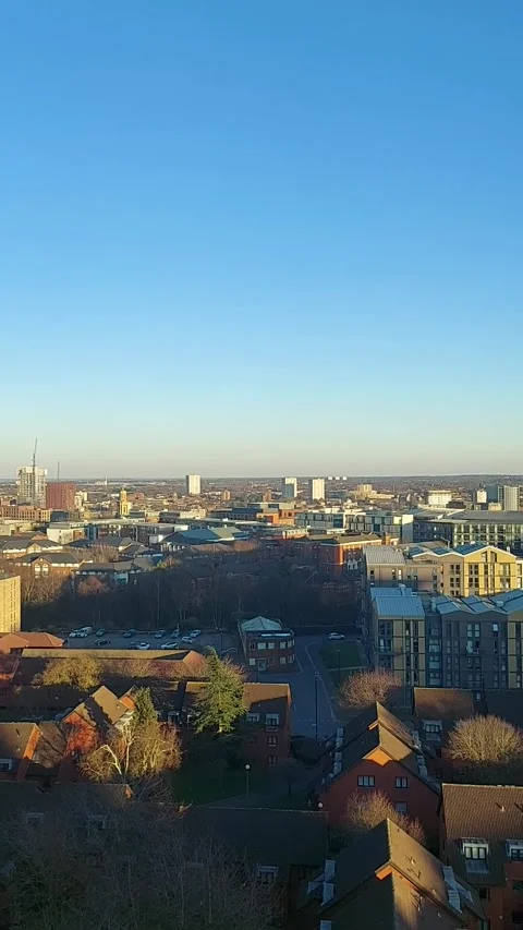 Vertical Pan of Cityscape - Sunny Moving Left to Right - Architectural Details Stock Footage 304644846