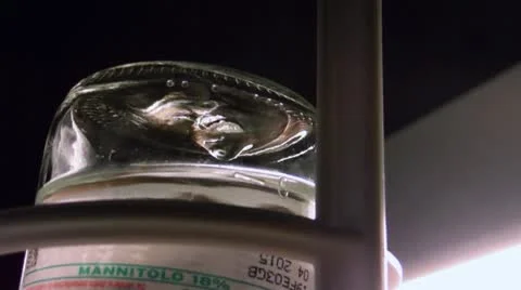 Vertical pan IV drip infusion Stock-Footage 12160153