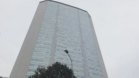 Vertical pan of Pirelli Tower near Milano Centrale station Stock Footage 339772240