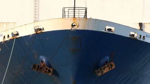 Vertical pan on a russian cargo stationing in a harbour Stock Footage 97953485