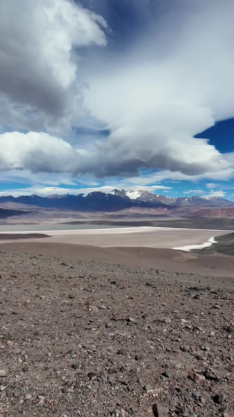 Vertical pan shot of Balcon del Pissis high altitude lagoons and majestic m.. Stock Footage 336009678