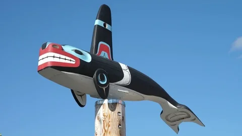 Vertical Pan Shot of Orca Killer Whale Totem Pole Carving Carcross Yukon Stock Footage 80723871