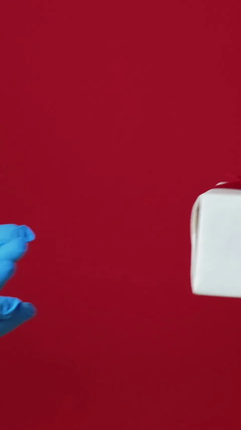 Vertical pandemic present gift delivery hands box Stock Footage 255262052