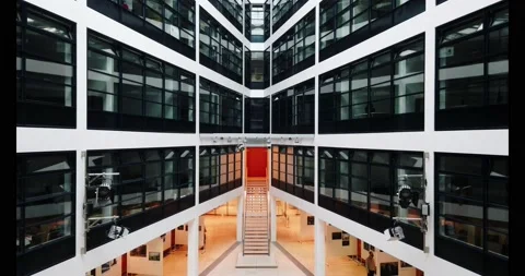 Vertical panning inside a modern office building Video stock 135824194