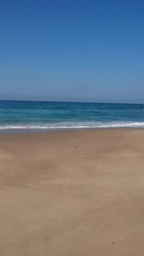 Vertical panning shot of the coastline of Playa del Picon, Asturias Stock Footage 150432473