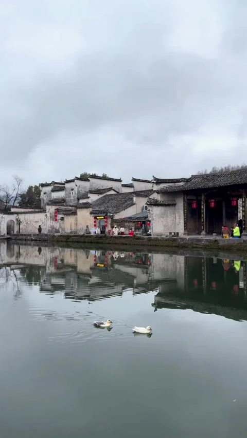 Vertical Panning View of Ancient Huizhou Architecture Reflected in Nanhu Lak Stock Footage 330145856