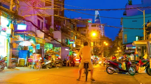 Vertical panning view of the busy night street in Ho Chi Minh City Stock Footage 62257386