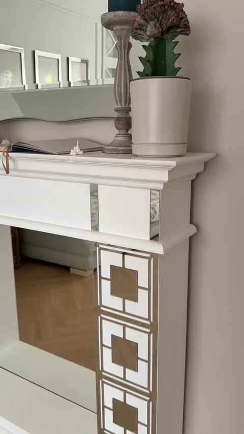 Vertical - Panning View Of Modern White Fireplace Mantel With Decor Video stock 345346673