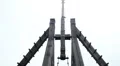 Vertical panorama of ancient battle weapon, wooden catapult at outdoor museum HD Footage
