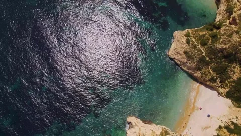Vertical panorama of a small beach and rocky shore Stock Footage 240636782