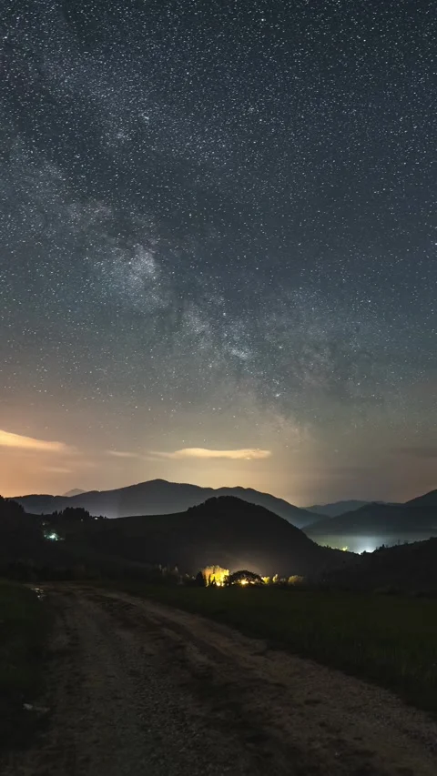 Vertical panorama of Starry night sky with Milky Way Galaxy stars over Video stock 263250215
