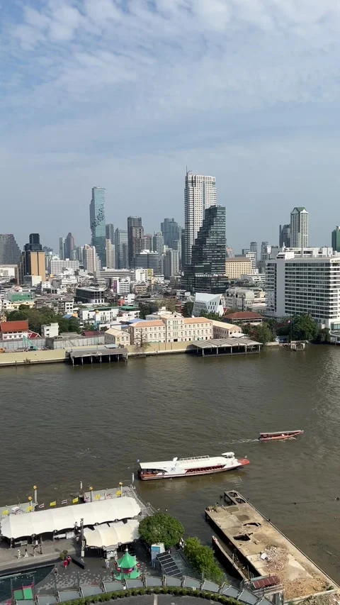 Vertical panoramic view of Bangkok skyline and Chao Phraya River Stock Footage 346184143