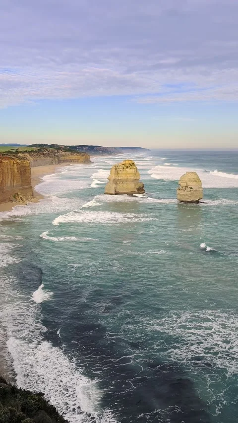 Vertical panoramic view of iconic Twelve Apostles limestone rock formations Stock Footage 345293248
