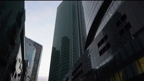 Vertical panoramic view of office buildings. Skyscrapers of glass. Daytime Video stock 105292669