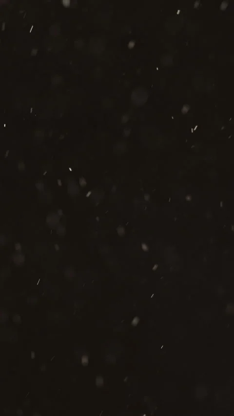Vertical particles overlay bokeh circles... | Stock Video | Pond5