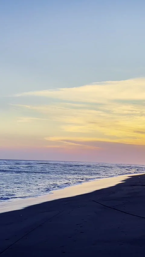 Vertical Pastel Sunset Beach Shoreline Stock Footage 337533446