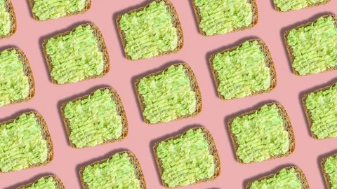 Vertical pattern with avocado toast. Creative background for cell phone. Stock Footage 129499170