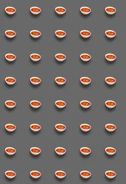 Vertical pattern with a bowl filled with borscht on a gray background. Cookin Stock Photos
