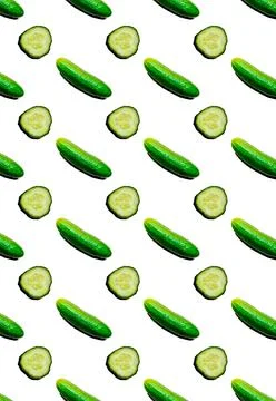 Vertical pattern with different fresh cucumbers on a white background. Vegeta Foto stock