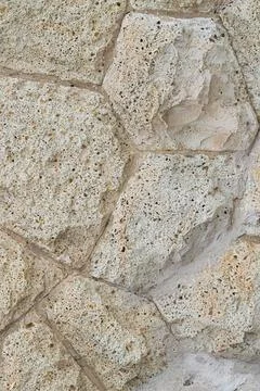 Vertical pattern gray stone background closeup of cobblestones with lines Stock Photos