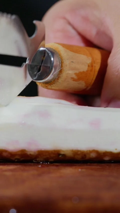 Vertical: Peeling the outer skin off a Chinese yam. 库存影片 341837021
