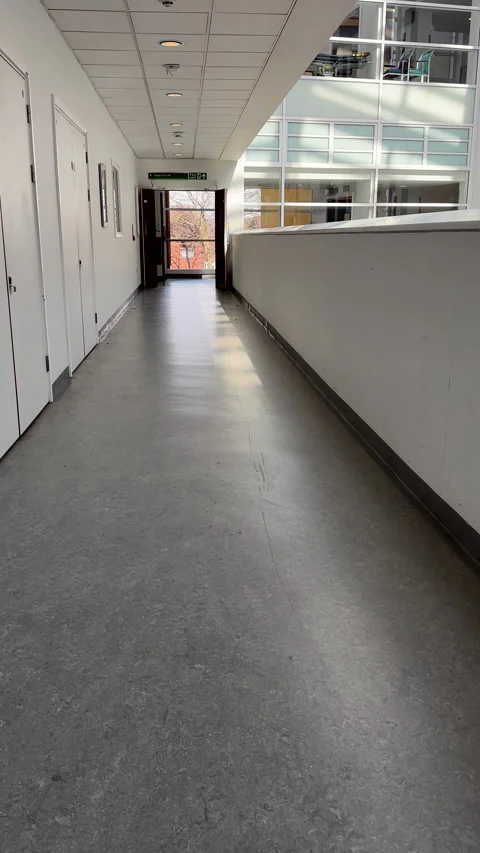 Vertical. Personal point of view walking along the passage in hospital. Stock Footage 304754289