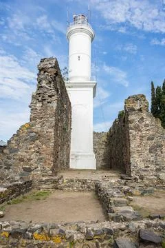 Vertical perspective of the historic lighthouse and Franciscan convent ruin.. Stock Photos