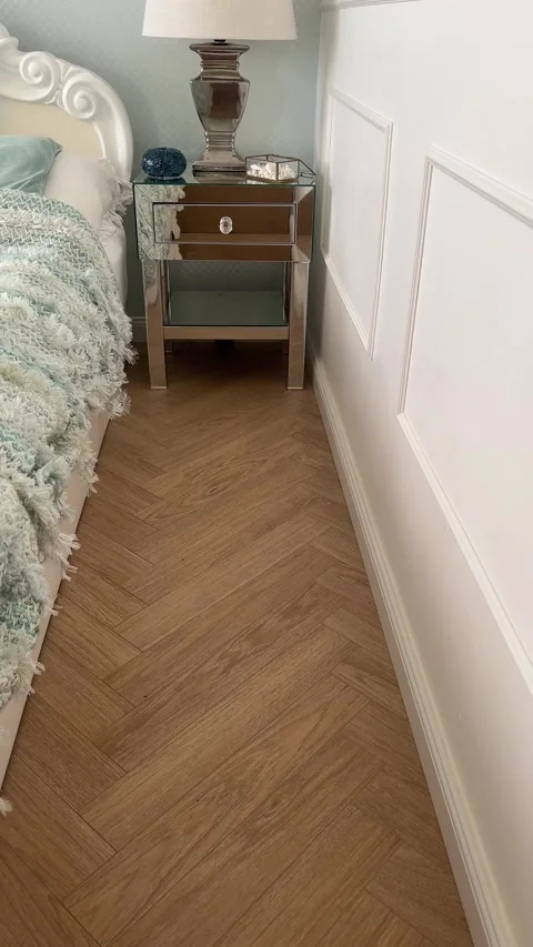 Vertical perspective of luxury bedroom with mint green decor and wall molding Stock Footage 346486667