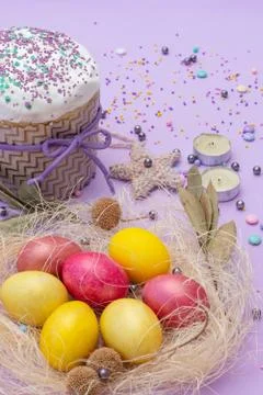 Vertical photo of Easter attributes in yellow-pink tones Stock Photos
