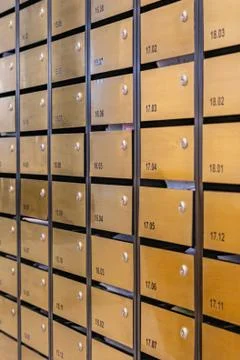 Vertical photo of mailbox array at postal room in condominium Foto stock