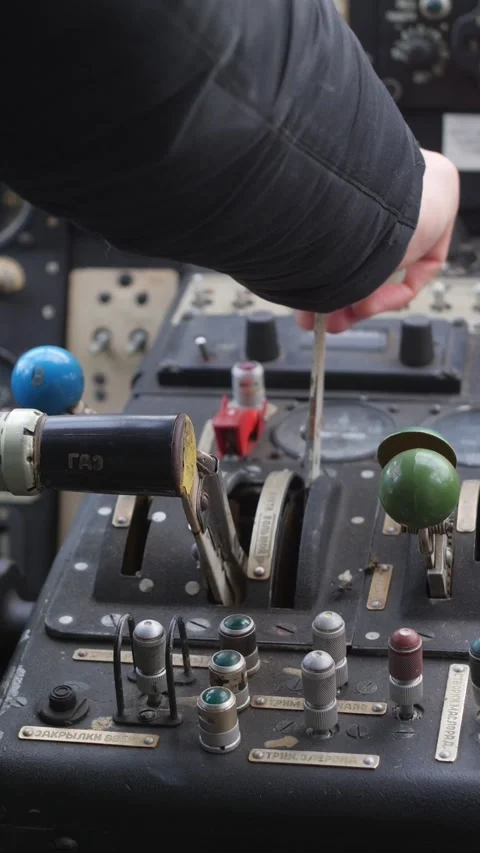 Vertical. Pilot push thrust lever handle for takeoff a old plane in the cockpit Stock-Footage 325221966