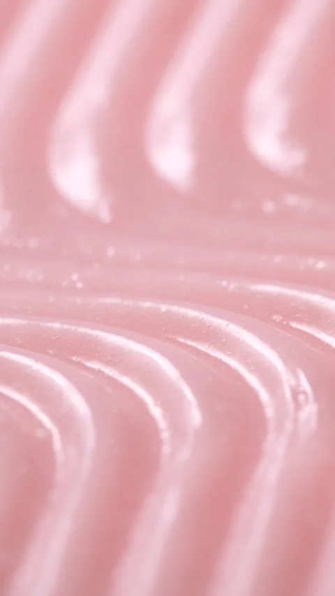 Vertical pink smooth eye, makeup skin cream texture, beauty facial cosmetic mask Stock Footage 317214984