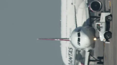 Vertical Planes Crossing while Taxiing at LAX International Airport Stock Footage 55353654