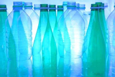 Vertical plastic bottles with transparency Фото