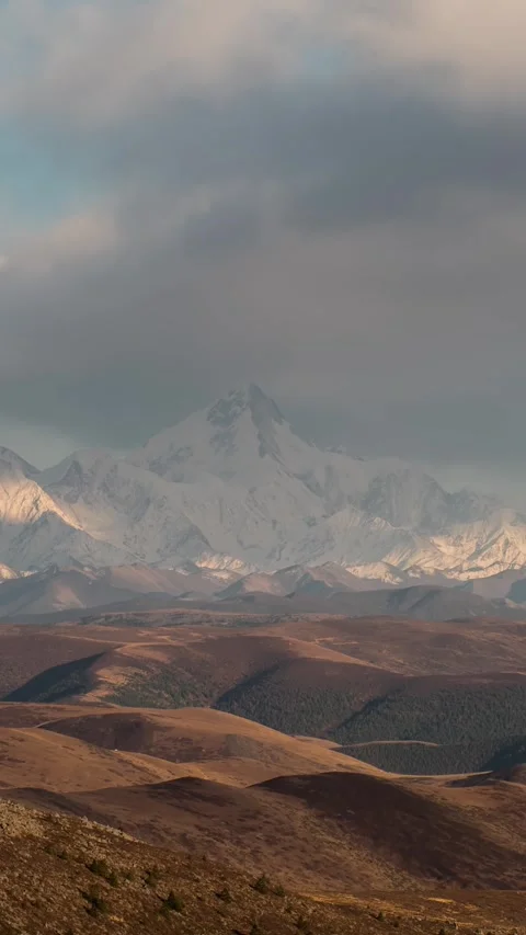 Vertical Plateau Snow Mountain Clouds Timelapse with Rolling Peaks Nature Vista Stock Footage 327479566