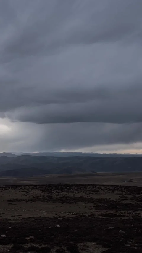 Vertical Plateau Storm Clouds Timelapse with Dark Sky and Dramatic Nature Vista Stock Footage 327478223